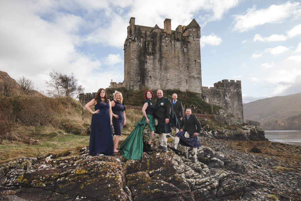a wedding at Eilean Donan castle on the isle of skye with a few guests to celebrate together