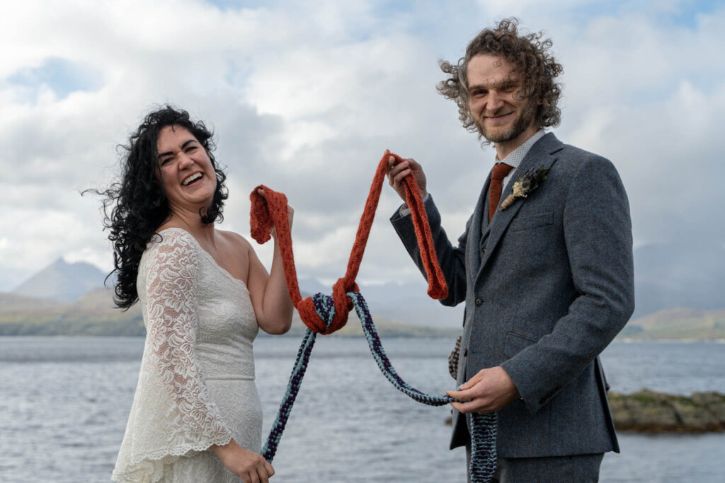 couple in a wedding ceremony on the Isle of Skye by What style of wedding photography works on the Isle of Skye?