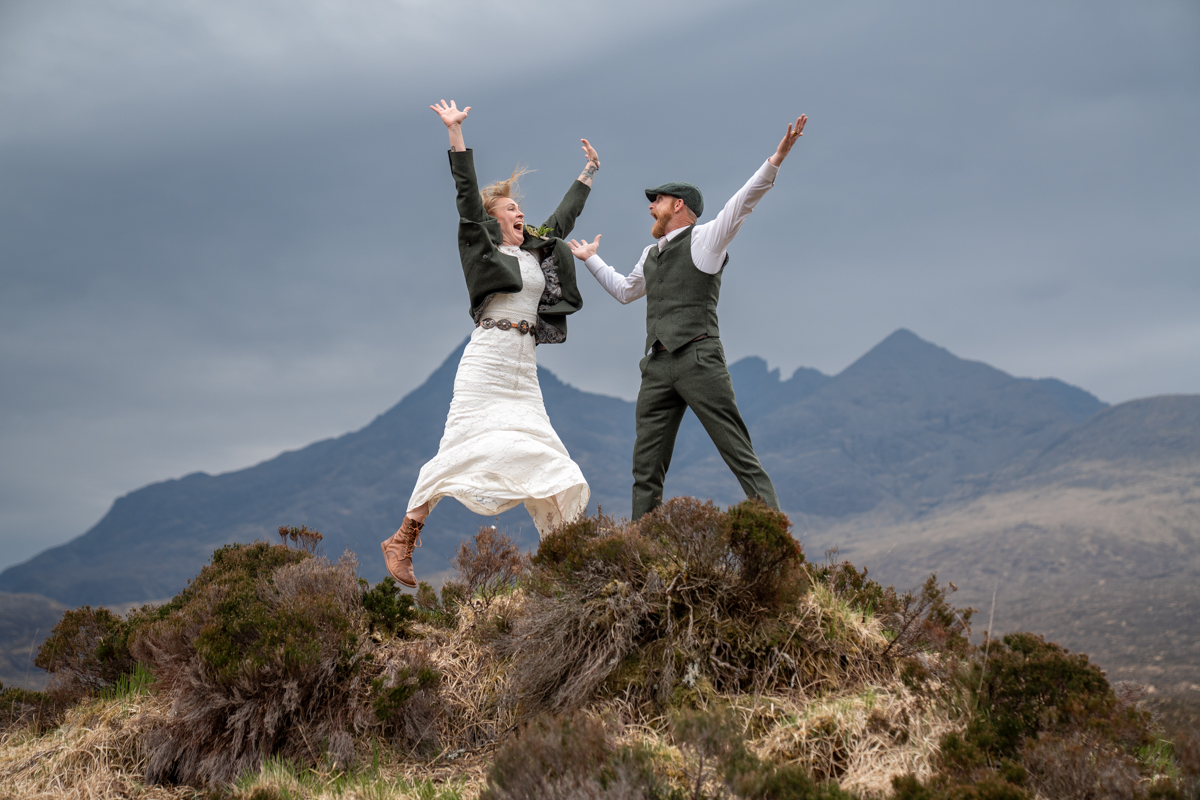 jumping for joy to celebrate a wedding on the isle of skye