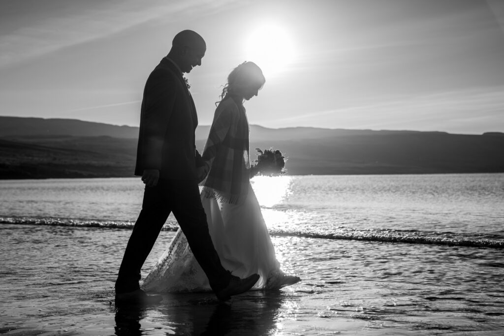 Isle of Skye elopement photographer capturing couple at sunset