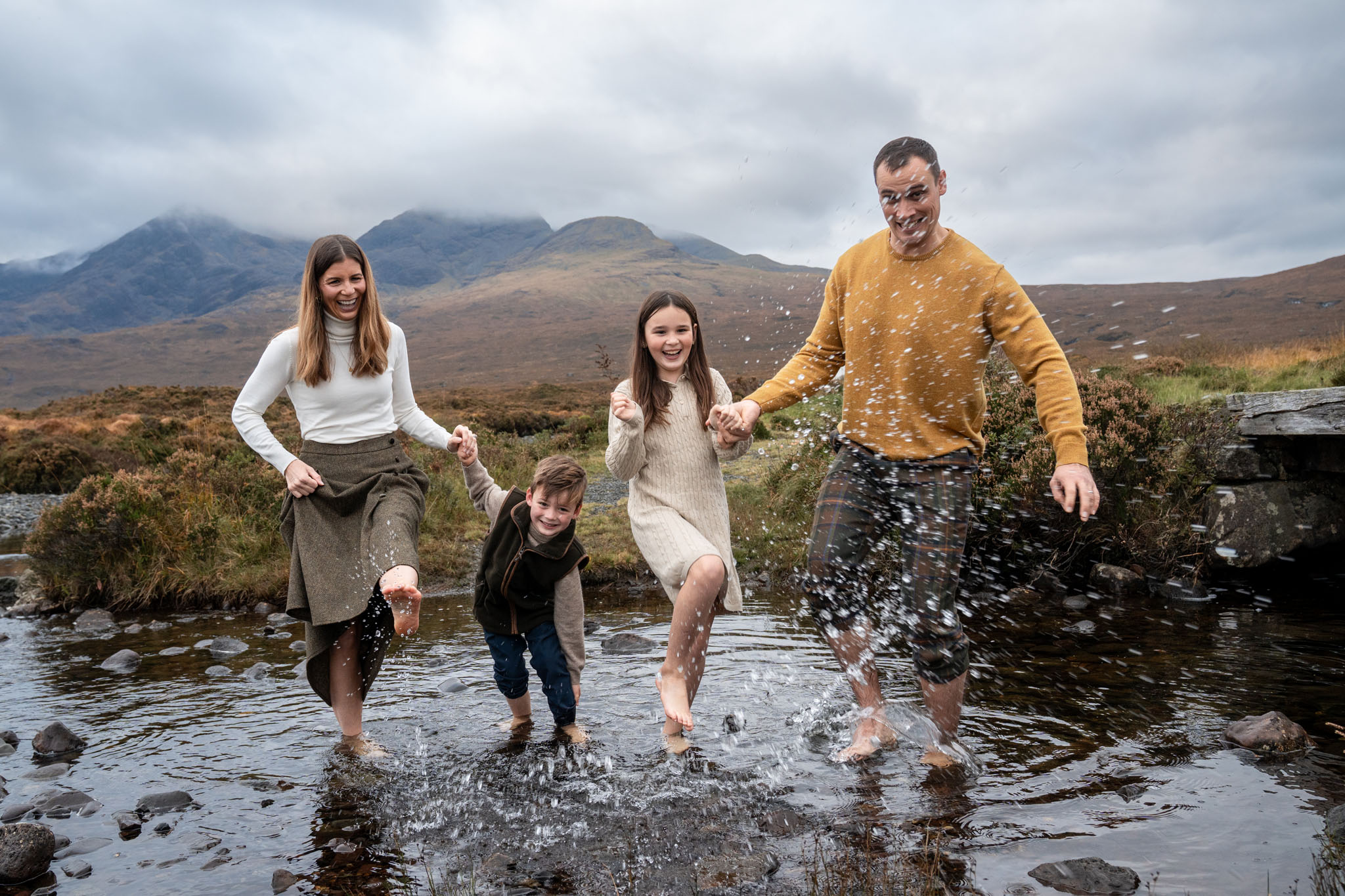 Children playing during a family photoshoot on the Isle of Skye